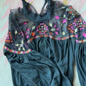 Free People embroidered sheer top.